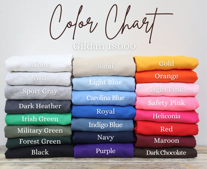 A color chart displaying various colored t-shirts, with each color represented by a different stack of t-shirts.