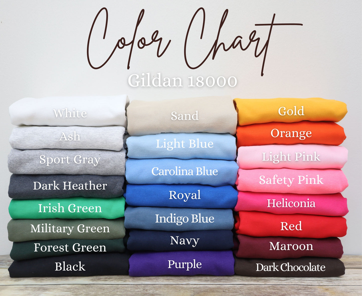 A color chart displaying various colored t-shirts, with each color represented by a different stack of t-shirts.