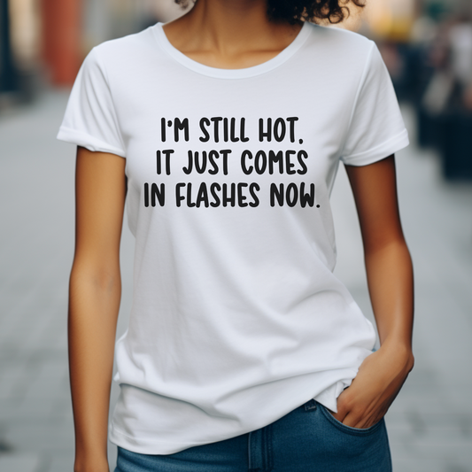 Person wearing a white t-shirt with humorous text on a blurred street background